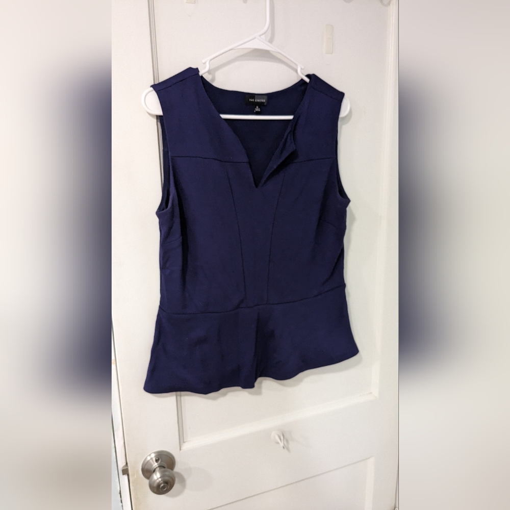 The limited peplum top. Medium, size 8. Dress blouse